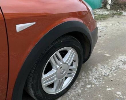 Помаранчевий Рено Сценік, об'ємом двигуна 2 л та пробігом 171 тис. км за 6250 $, фото 77 на Automoto.ua