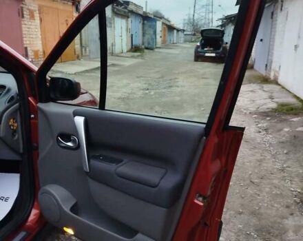 Помаранчевий Рено Сценік, об'ємом двигуна 2 л та пробігом 171 тис. км за 6250 $, фото 118 на Automoto.ua