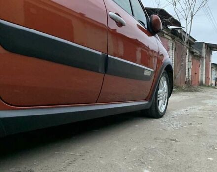 Помаранчевий Рено Сценік, об'ємом двигуна 2 л та пробігом 171 тис. км за 6250 $, фото 68 на Automoto.ua