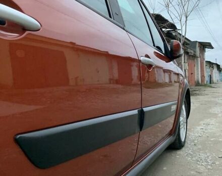 Помаранчевий Рено Сценік, об'ємом двигуна 2 л та пробігом 171 тис. км за 6250 $, фото 76 на Automoto.ua