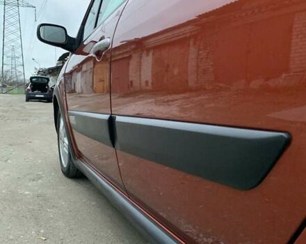 Помаранчевий Рено Сценік, об'ємом двигуна 2 л та пробігом 171 тис. км за 6250 $, фото 86 на Automoto.ua