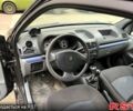 Черный Рено Симбол, объемом двигателя 1.4 л и пробегом 235 тыс. км за 3300 $, фото 1 на Automoto.ua