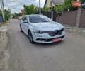 Белый Рено Talisman, объемом двигателя 1.6 л и пробегом 57 тыс. км за 13600 $, фото 1 на Automoto.ua