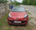 Красный Рено Винд, объемом двигателя 1.2 л и пробегом 100 тыс. км за 4750 $, фото 1 на Automoto.ua