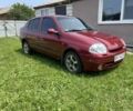 Красный Рено Clio Symbol, объемом двигателя 1.4 л и пробегом 274 тыс. км за 2700 $, фото 1 на Automoto.ua