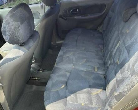 Красный Рено Clio Symbol, объемом двигателя 1.4 л и пробегом 274 тыс. км за 2700 $, фото 3 на Automoto.ua