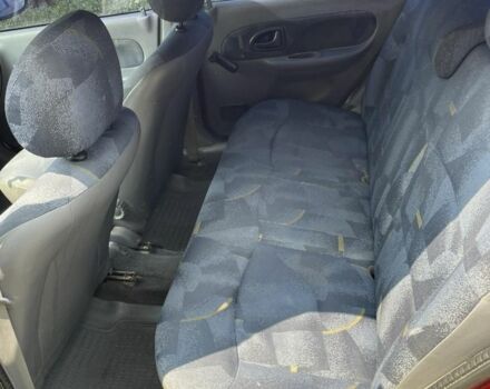 Красный Рено Clio Symbol, объемом двигателя 1.4 л и пробегом 274 тыс. км за 2700 $, фото 4 на Automoto.ua