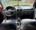Красный Рено Clio Symbol, объемом двигателя 1.4 л и пробегом 274 тыс. км за 2700 $, фото 5 на Automoto.ua