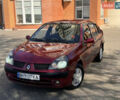 Красный Рено Clio Symbol, объемом двигателя 1.4 л и пробегом 421 тыс. км за 2777 $, фото 1 на Automoto.ua