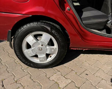 Красный Рено Clio Symbol, объемом двигателя 1.4 л и пробегом 421 тыс. км за 2777 $, фото 14 на Automoto.ua