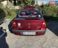 Красный Рено Clio Symbol, объемом двигателя 1.4 л и пробегом 281 тыс. км за 2650 $, фото 10 на Automoto.ua