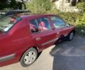 Красный Рено Clio Symbol, объемом двигателя 1.39 л и пробегом 281 тыс. км за 2600 $, фото 10 на Automoto.ua