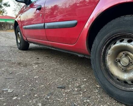 Красный Рено Clio Symbol, объемом двигателя 1.39 л и пробегом 259 тыс. км за 1799 $, фото 5 на Automoto.ua