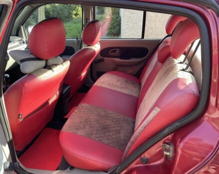 Красный Рено Clio Symbol, объемом двигателя 1.39 л и пробегом 281 тыс. км за 2600 $, фото 16 на Automoto.ua