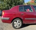 Красный Рено Clio Symbol, объемом двигателя 1.4 л и пробегом 281 тыс. км за 2650 $, фото 7 на Automoto.ua