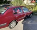 Красный Рено Clio Symbol, объемом двигателя 1.4 л и пробегом 281 тыс. км за 2650 $, фото 3 на Automoto.ua