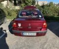 Красный Рено Clio Symbol, объемом двигателя 1.39 л и пробегом 281 тыс. км за 2600 $, фото 1 на Automoto.ua
