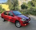 Красный Рено Clio Symbol, объемом двигателя 1.4 л и пробегом 295 тыс. км за 1699 $, фото 1 на Automoto.ua