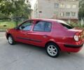 Красный Рено Clio Symbol, объемом двигателя 1.4 л и пробегом 295 тыс. км за 1699 $, фото 1 на Automoto.ua