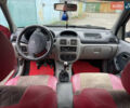 Красный Рено Clio Symbol, объемом двигателя 1.39 л и пробегом 164 тыс. км за 2999 $, фото 1 на Automoto.ua