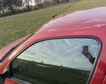 Красный Рено Clio Symbol, объемом двигателя 1.4 л и пробегом 174 тыс. км за 3100 $, фото 8 на Automoto.ua