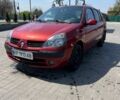 Красный Рено Clio Symbol, объемом двигателя 1.4 л и пробегом 212 тыс. км за 2100 $, фото 1 на Automoto.ua