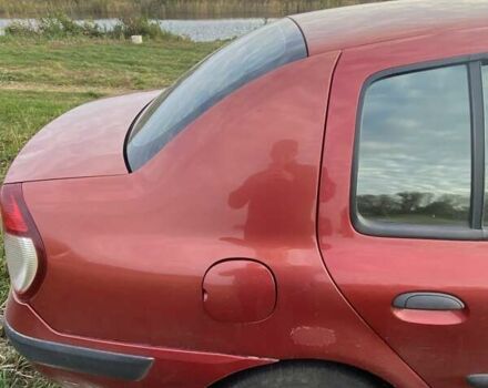 Красный Рено Clio Symbol, объемом двигателя 1.4 л и пробегом 174 тыс. км за 3100 $, фото 9 на Automoto.ua