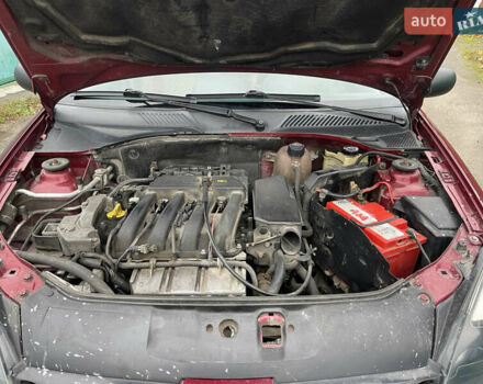 Красный Рено Clio Symbol, объемом двигателя 1.39 л и пробегом 164 тыс. км за 2999 $, фото 3 на Automoto.ua