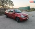 Красный Рено Clio Symbol, объемом двигателя 1.39 л и пробегом 200 тыс. км за 2800 $, фото 1 на Automoto.ua