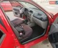 Красный Рено Clio Symbol, объемом двигателя 1.4 л и пробегом 280 тыс. км за 3200 $, фото 2 на Automoto.ua