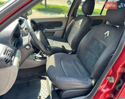 Червоний Рено Clio Symbol, об'ємом двигуна 1.39 л та пробігом 340 тис. км за 2999 $, фото 35 на Automoto.ua