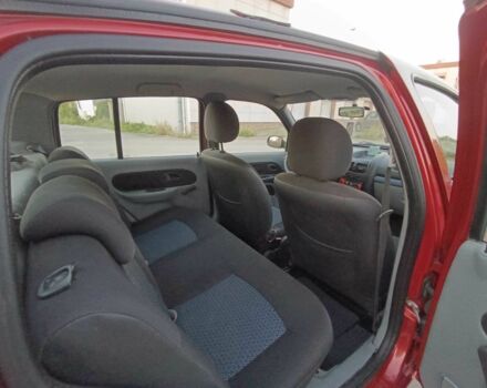Красный Рено Clio Symbol, объемом двигателя 1.4 л и пробегом 200 тыс. км за 2800 $, фото 8 на Automoto.ua