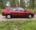 Красный Рено Clio Symbol, объемом двигателя 1.4 л и пробегом 136 тыс. км за 4800 $, фото 2 на Automoto.ua