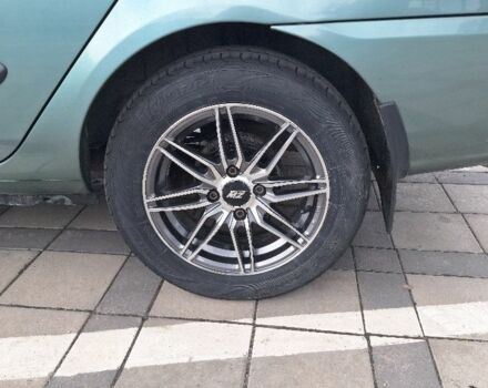 Зеленый Рено Clio Symbol, объемом двигателя 1.4 л и пробегом 165 тыс. км за 4000 $, фото 12 на Automoto.ua