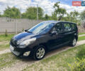 Чорний Рено Megane Scenic, об'ємом двигуна 1.5 л та пробігом 215 тис. км за 7299 $, фото 1 на Automoto.ua