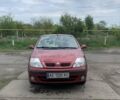 Красный Рено Megane Scenic, объемом двигателя 1.9 л и пробегом 242 тыс. км за 3500 $, фото 1 на Automoto.ua