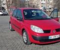 Красный Рено Megane Scenic, объемом двигателя 1.6 л и пробегом 270 тыс. км за 4500 $, фото 1 на Automoto.ua