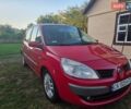 Красный Рено Megane Scenic, объемом двигателя 2 л и пробегом 200 тыс. км за 6100 $, фото 1 на Automoto.ua