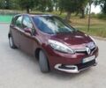 Красный Рено Megane Scenic, объемом двигателя 1.5 л и пробегом 209 тыс. км за 9000 $, фото 1 на Automoto.ua