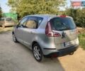 Серый Рено Megane Scenic, объемом двигателя 1.5 л и пробегом 180 тыс. км за 7500 $, фото 1 на Automoto.ua