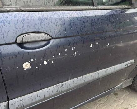 Рено Megane Scenic 2000 в Львове на Automoto.ua Синий Рено Megane Scenic, объемом двигателя 2 л и пробегом 305 тыс. км за 2600 $, фото 9 на Automoto.ua