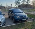 Зеленый Рено Megane Scenic, объемом двигателя 2 л и пробегом 200 тыс. км за 5600 $, фото 1 на Automoto.ua