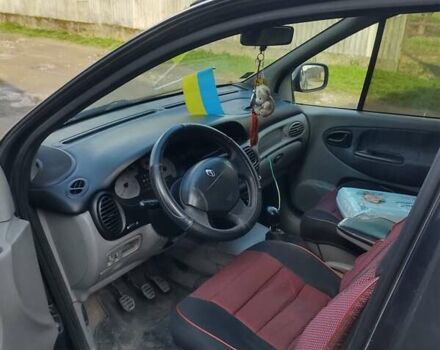 Зеленый Рено Megane Scenic, объемом двигателя 1.9 л и пробегом 238 тыс. км за 4400 $, фото 1 на Automoto.ua