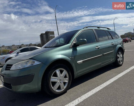 Зеленый Рено Megane Scenic, объемом двигателя 1.6 л и пробегом 190 тыс. км за 5500 $, фото 1 на Automoto.ua