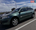 Зеленый Рено Megane Scenic, объемом двигателя 1.6 л и пробегом 190 тыс. км за 5500 $, фото 1 на Automoto.ua