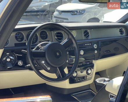 Черный Ролс Ройс Phantom Drophead Coupe, объемом двигателя 6.75 л и пробегом 124 тыс. км за 220000 $, фото 14 на Automoto.ua