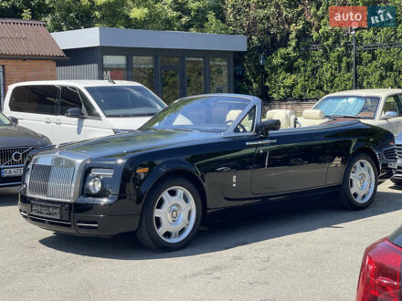 Ролс Ройс Phantom Drophead Coupe 2009 у Києві на Automoto.ua Чорний Ролс Ройс Phantom Drophead Coupe, об'ємом двигуна 6.75 л та пробігом 124 тис. км за 220000 $, фото 1 на Automoto.ua