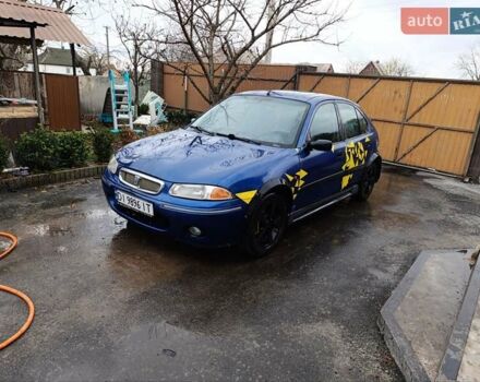 Синий Ровер 200, объемом двигателя 1.4 л и пробегом 235 тыс. км за 1300 $, фото 1 на Automoto.ua