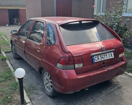 Красный СМА Maple R80, объемом двигателя 1.76 л и пробегом 100 тыс. км за 1200 $, фото 2 на Automoto.ua