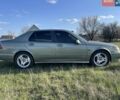Зеленый Сааб 9-5, объемом двигателя 2 л и пробегом 308 тыс. км за 3500 $, фото 1 на Automoto.ua